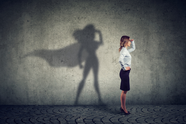 Professional businesswoman superhero representing SuperPayroll empowering payroll success